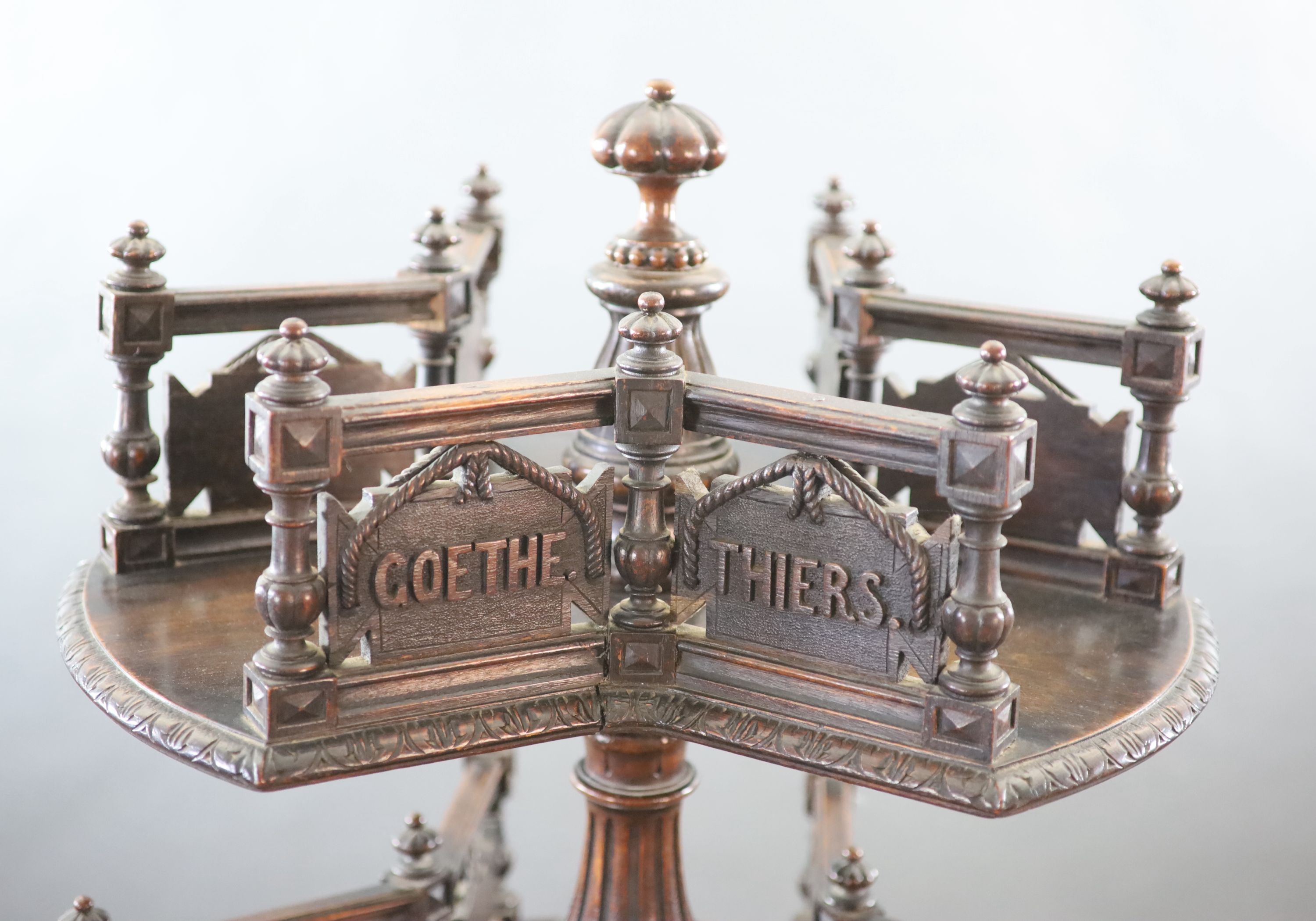 An unusual 19th century Black Forest oak revolving bookcase, W.66cm H.158cm